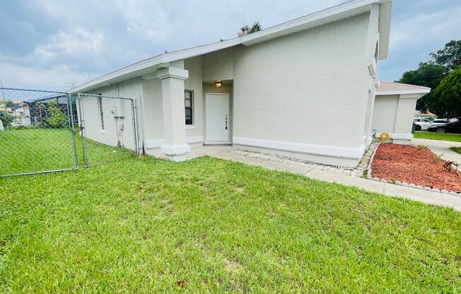 Beautiful 4 Bed / 2 Bath Single-Family Home with Fenced Yard & Screened Patio
