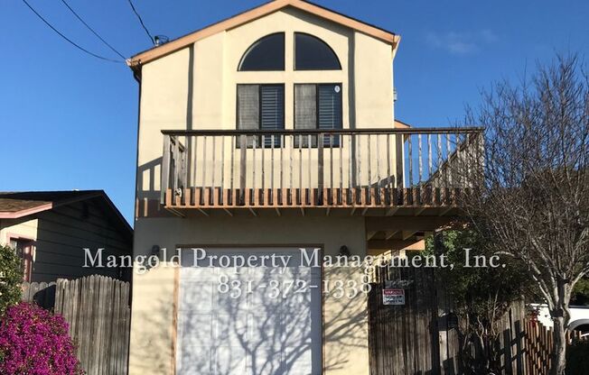 Charming Two-Story 2-Bed 2-Bath Home with Wrap-Around Balcony & Hardwood Floors in Seaside