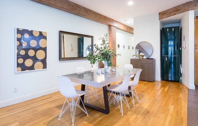 Amazing SOHO style full level designer Parkhouse in boutique 3 unit building, featuring an expansive living space, gourmet kitchen, two patios and pets welcome!