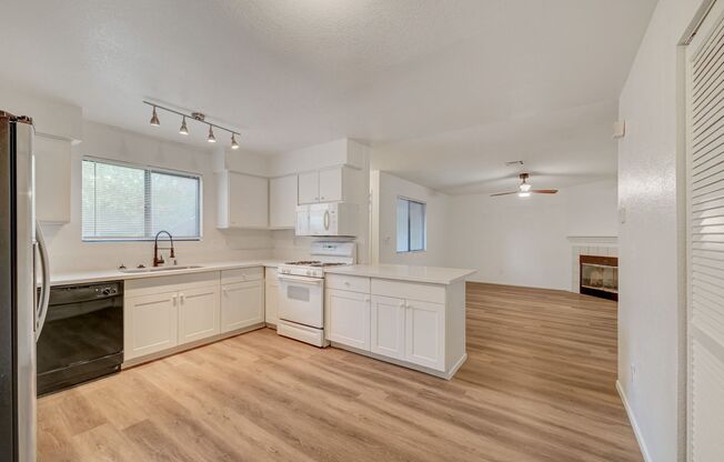 Welcome to this beautifully remodeled ground-floor residence, ideally situated near Charleston and Rainbow.