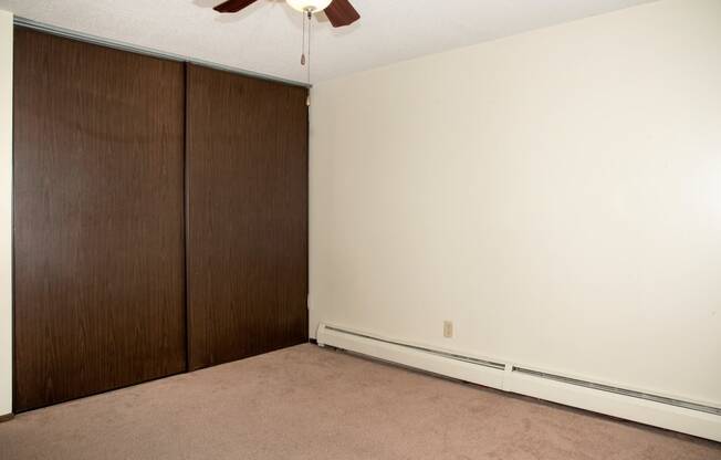 first bedroom, spacious closets, ceiling fan