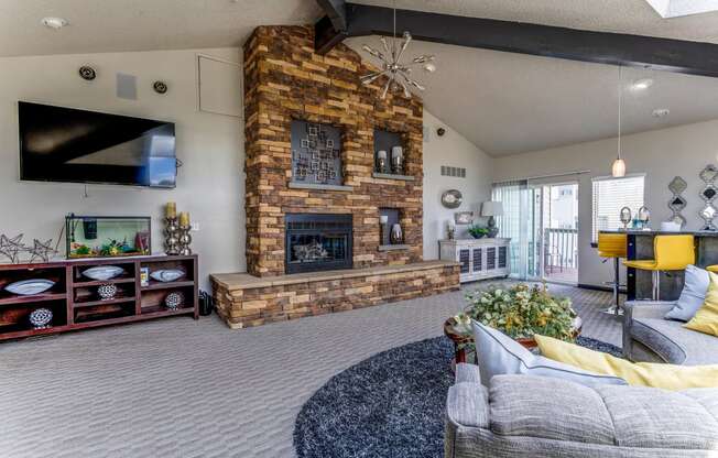 Clubhouse with fireplace and tv  at Union Heights Apartments, Colorado Springs, CO