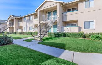 a large lawn in front of a house