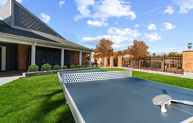 Outdoor ping pong table with building in background  at Westwinds Apartments, Annapolis MD