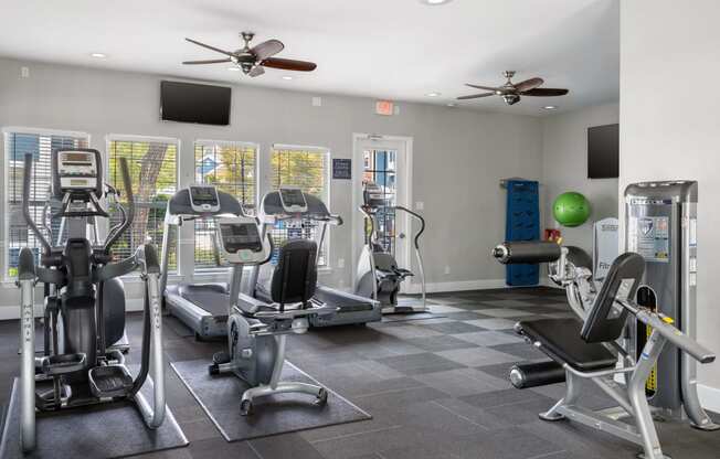a fitness center with fitness equipment
