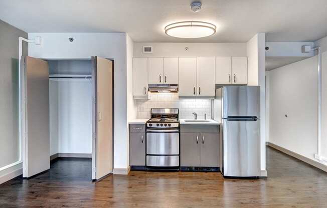 Kitchen with wooden floor at Cosmopolitan, Seattle, WA, 98105