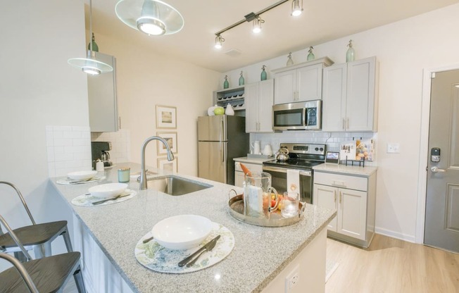 a kitchen with a counter top and a sink