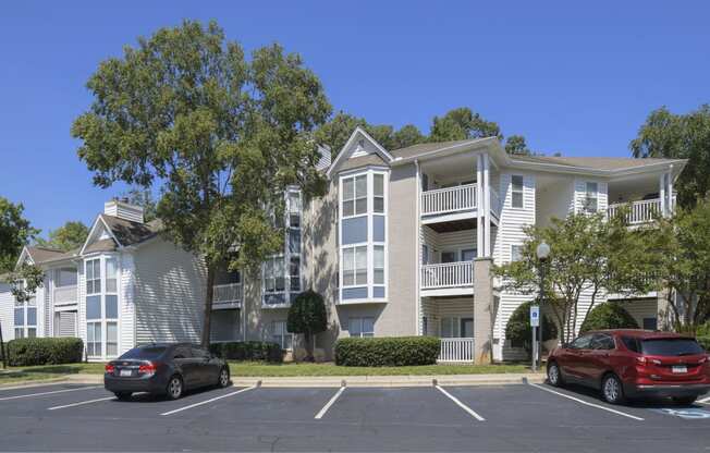 a parking lot and building at Whitehall Estate apartments in Charlotte NC