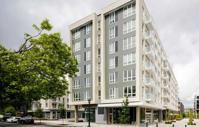 apartment building with pedestrian walkway at Slabtown Square Apartments, Portland , OR 97209