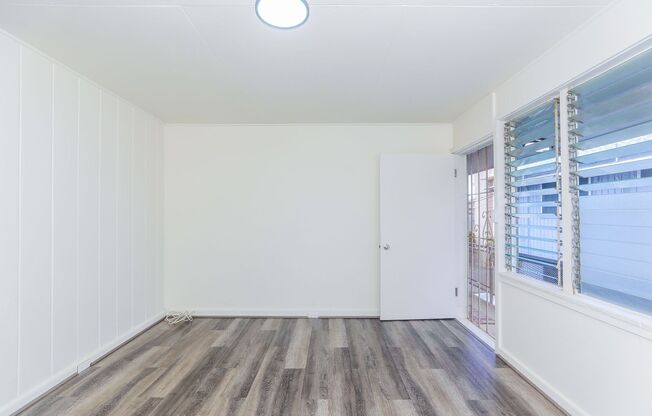 Renovated 2 bedroom, 1 bath upstairs unit includes all utiilities