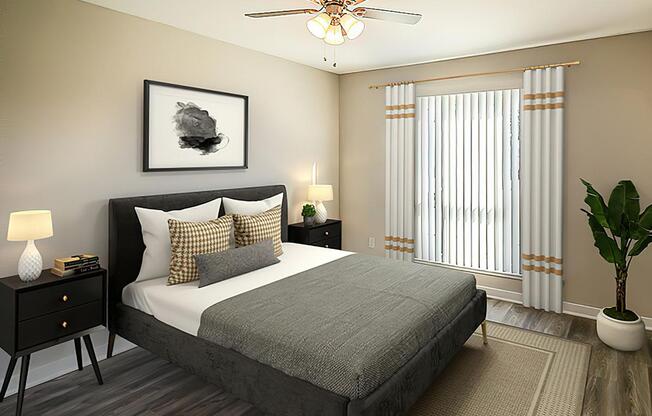 a bedroom with a bed and desk in a hotel room