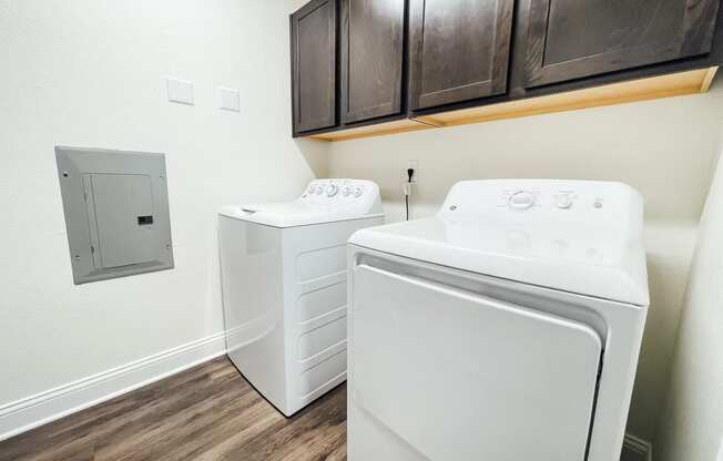 the private laundry room of our studio apartment atrium has a washer dryer