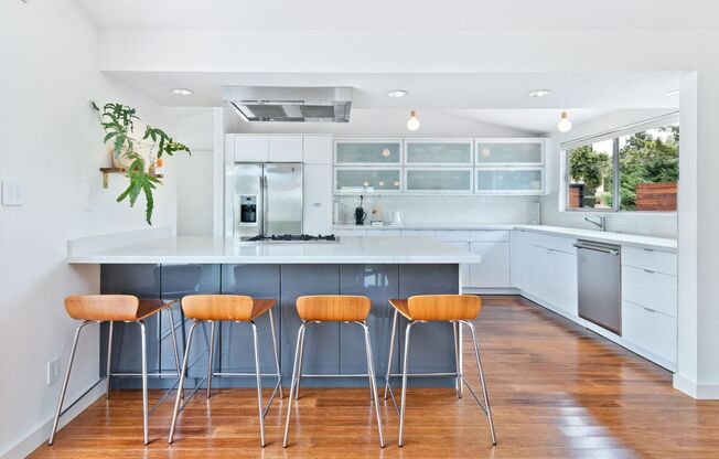 A Fully Furnished Modern Portfolio Home with a Large Backyard Oasis & 3 Comfortable Bedrooms!