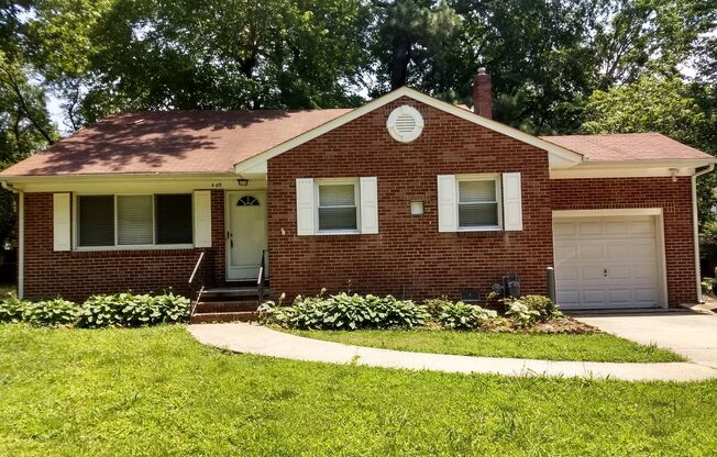 TRI-LEVEL HOME WITH GARAGE AND LARGE FENCED IN YARD-PETS NEGOTIABLE