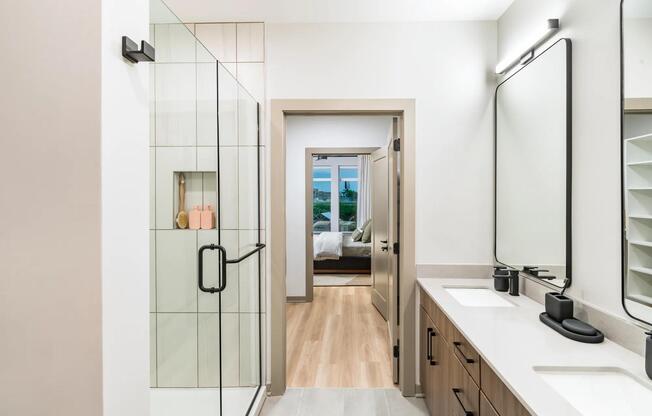 Dual vanity setup and spacious shower, all steps from the bedroom and closet for effortless flow.