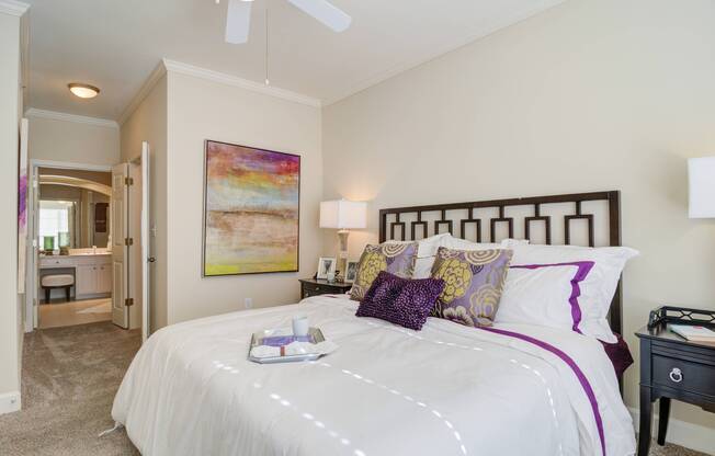 Purple-themed bedroom in an Atlanta apartment.