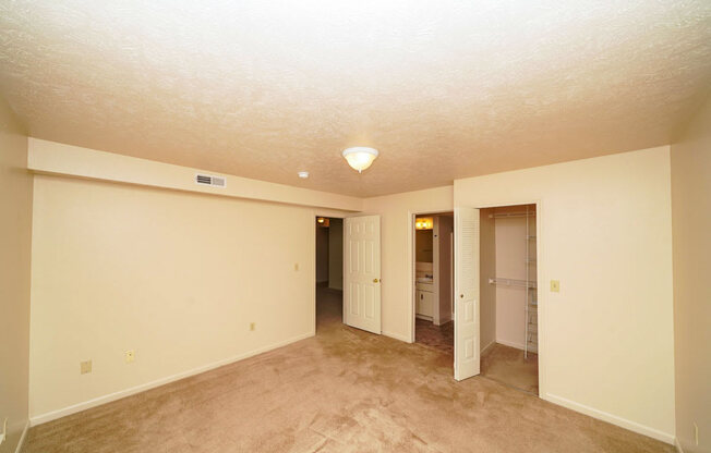 Master Bedroom with Ensuite at The Highlands Apartments in Elkhart, IN