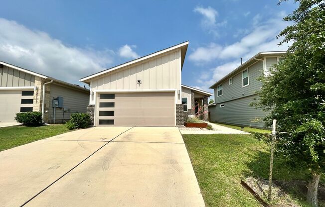 Modern and Cozy 3BR/2BA Home with Garage, Fenced Yard & Covered Deck!