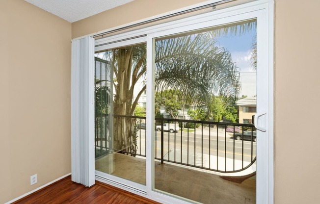 Mar Vista Apartments for Rent - Vista - Jones & Jones - Living Room With Sliding Glass Door Toward Patio