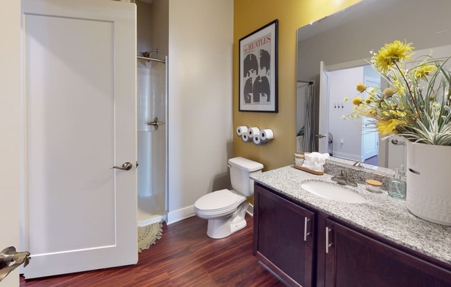 a bathroom with a toilet sink and shower at The Bend Arbordale, Williamsburg, VA, 23188
