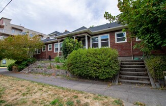 Charming One Bedroom Unit in Fourplex with Original Hardwoods, Breakfast Nook, Detached Garage