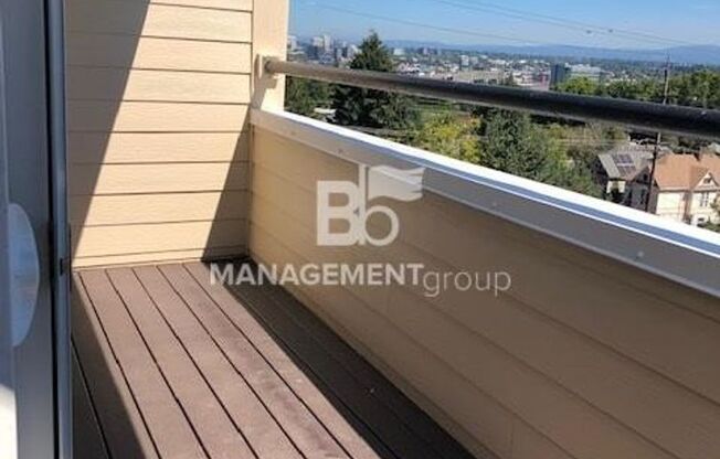 Sweeping Views of City & Mountain! Updated SW PDX Condo. Ton of Light & Upgrades! Parking & Most Utilities Included!