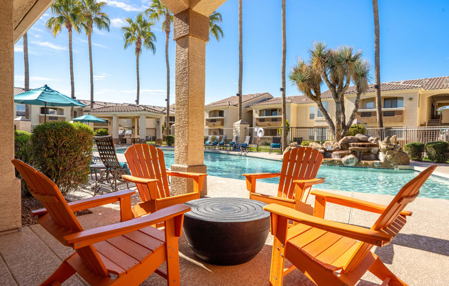 Poolside cabana with ample seating - Arrowhead Landing Apartments