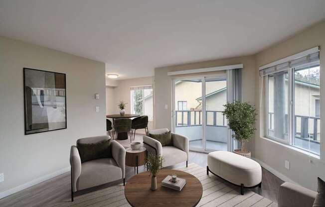 Living room with private balcony and oversized windows at 3030 Lake City Apartments in Seattle