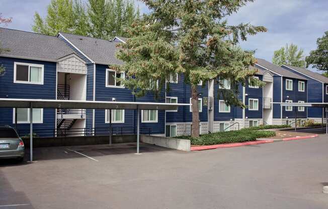 Clermont Exterior View of Apartments and Covered Parking Spaces