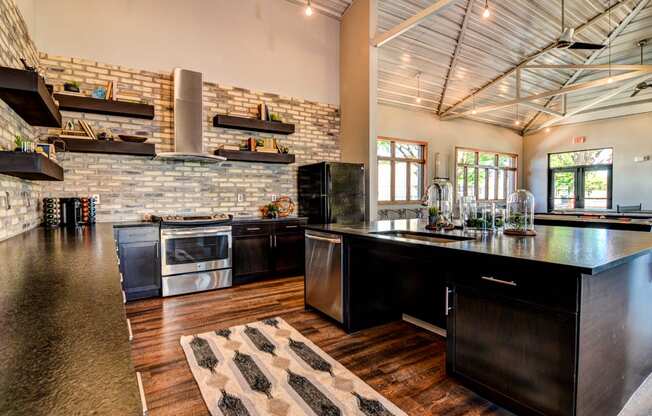 Clubhouse With Gourmet Kitchen at Aviator at Brooks Apartments, Clear Property Management, San Antonio, 78235