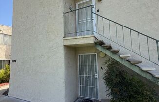 2BR/1BA Lakeside ground floor condo with 1 car detached garage, 1 uncovered parking space & community pool.