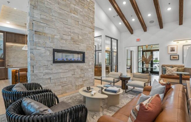 a living room with a couch and a fireplace