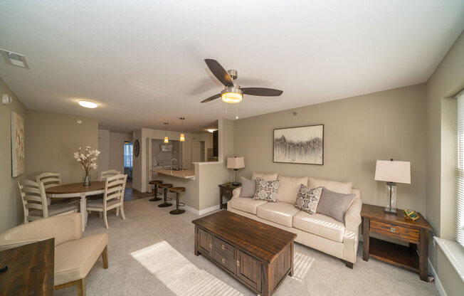 Living Room and Kitchen Breakfast Bar at Strathmore Apartment Homes, West Des Moines