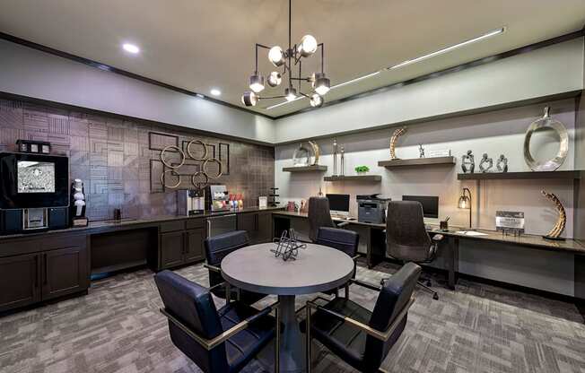 A conference room with a table and chairs.