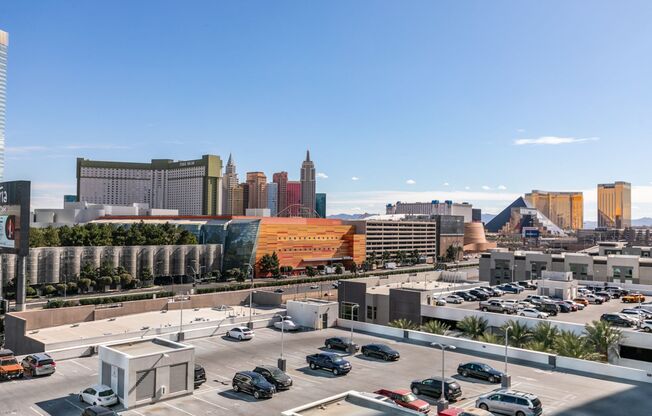 Iconic Strip-View Luxury | Elegant 1BR + Den High-Rise Residence