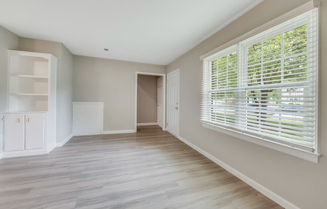 cameron apartments living room with bright large windows in wilson nc