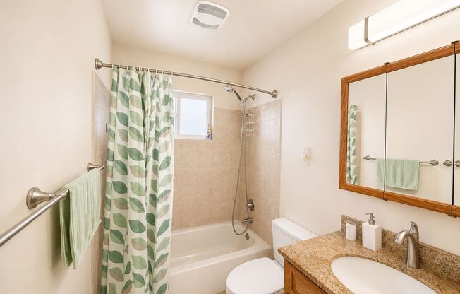 Bright, Updated Bungalow with 250 SF Bonus Sunroom