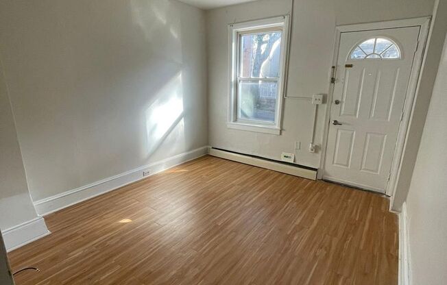 Cozy 2 bedroom 1 bathroom house with off-street parking