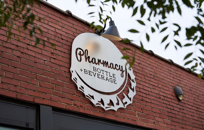 Stop by the local Pharmacy Bottle + Beverage for a drink near Novel Cary