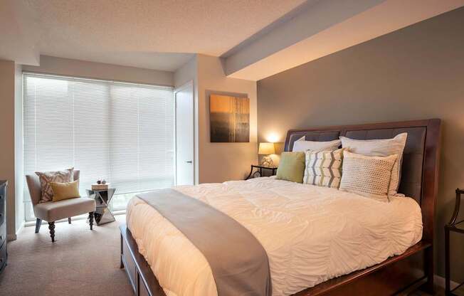 Bedroom with floor to ceiling windows