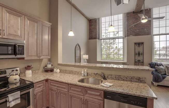 a kitchen with a sink and a counter top