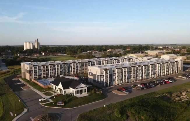 Studio, one, and two-bedroom apartment homes with stainless steel appliances, quarts countertops, designer cabinetry, large kitchens, luxury vinyl plank flooring, high vaulted ceilings, high-end lighting, in-unit washer and dryer, and energy efficient windows at Fireside at Waukee in Waukee, IA