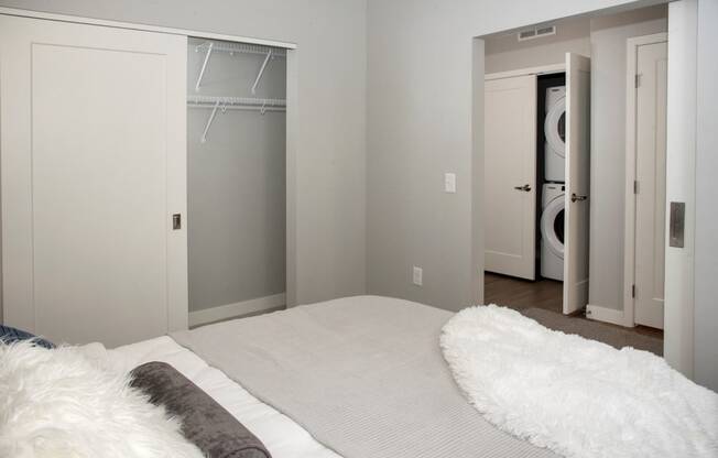 UPII foley alcove floor plan - bedroom with spacious closet, in-home washer and dryer at Urban Park I and II Apartments, St Louis Park, 55426