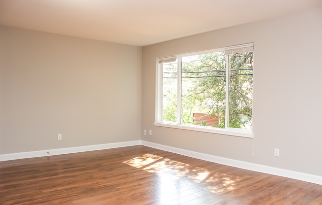 ONE Recently Renovated 2-Bedroom Apartment with Washer/Dryer and Reserved Parking Included!