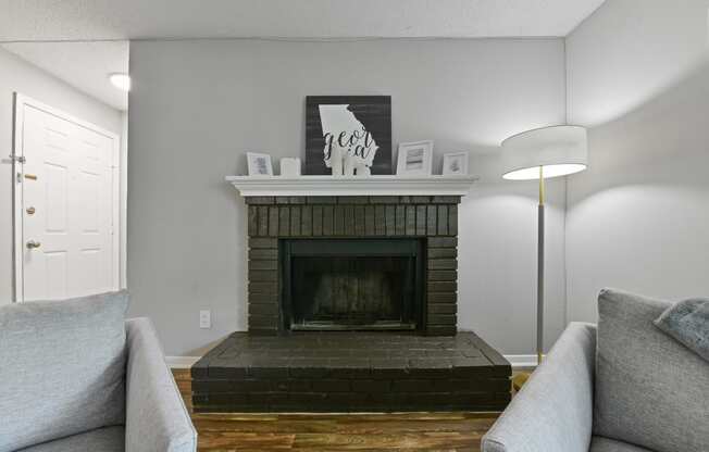 a living room with a fireplace and a couch