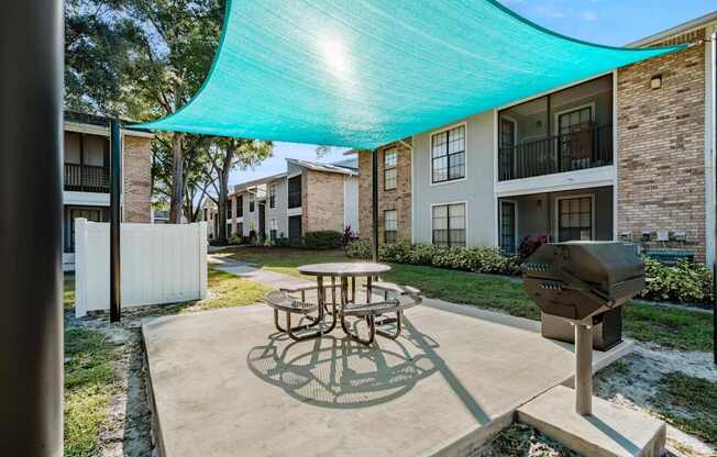 BBQ pavilion at Grand Pavilion Apartments in Tampa, FL