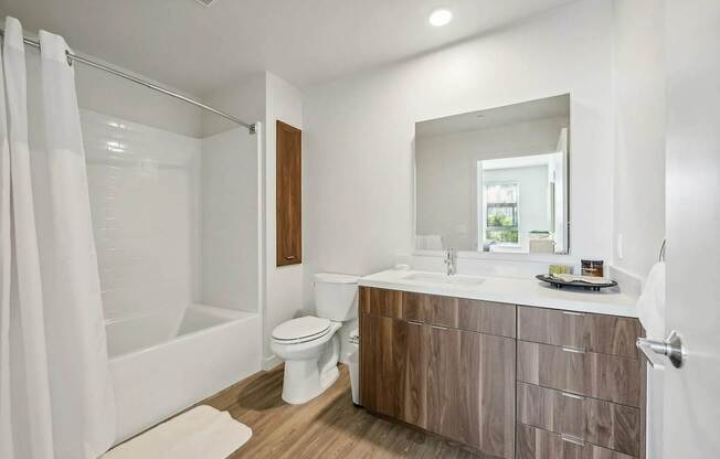 Bathroom with sink and mirror at Bayview Apartments, Emeryville, CA, 94608