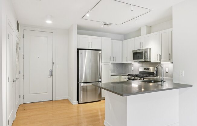 Kitchen with Modern appliances at Park77 Apartments, Cambridge