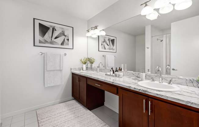 Bathroom with sink and large mirrors at San Pedro Bank Lofts, San Pedro