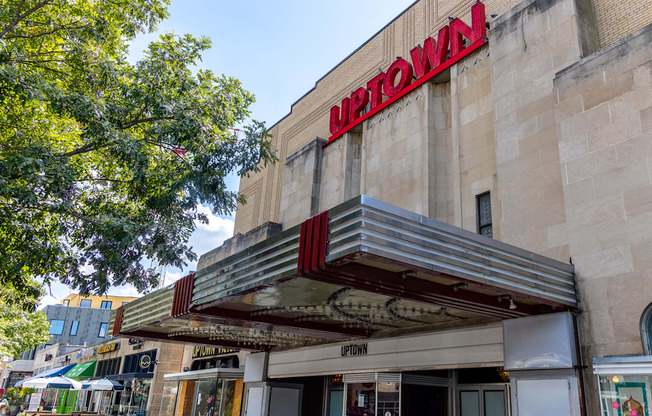 a building with a red sign on top of it